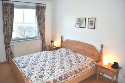 Ein Bett oder Betten in einem Zimmer der Unterkunft Ostseeallee 10 Ferienwohnung Nr 02