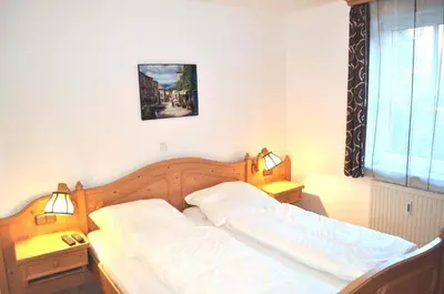 Ein Bett oder Betten in einem Zimmer der Unterkunft Ostseeallee 11 Ferienwohnung Nr 03