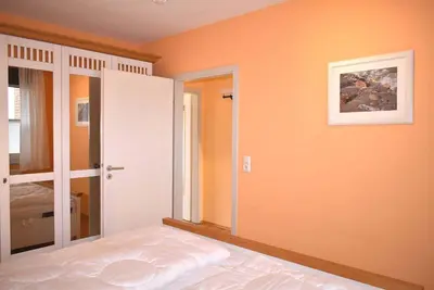 Ein Bett oder Betten in einem Zimmer der Unterkunft Ostseeallee 2 Ferienwohnung Nr 05