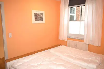 Ein Bett oder Betten in einem Zimmer der Unterkunft Ostseeallee 2 Ferienwohnung Nr 05