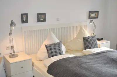 Ein Bett oder Betten in einem Zimmer der Unterkunft Ostseeallee 9 Ferienwohnung Nr 01