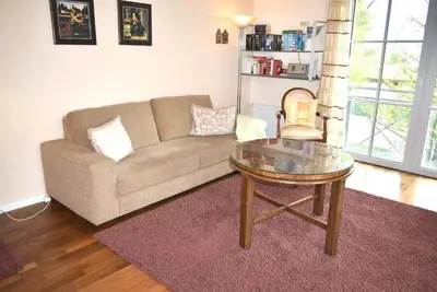 Ein Sitzbereich in der Unterkunft Residenz Niendorf Elegante Ferienwohnung Nr 13
