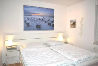 Ein Bett oder Betten in einem Zimmer der Unterkunft Residenz Niendorf Ferienwohnung Nr 05 Meerglück