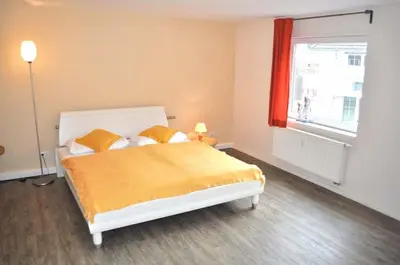 Ein Bett oder Betten in einem Zimmer der Unterkunft Residenz Niendorf Ferienwohnung Nr 09