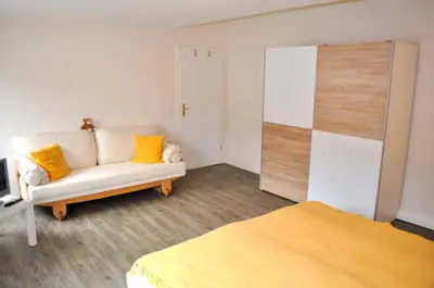 Ein Bett oder Betten in einem Zimmer der Unterkunft Residenz Niendorf Ferienwohnung Nr 09