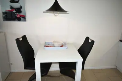 Ein Sitzbereich in der Unterkunft Strandhotel Appartement Nr 14 Meerblick
