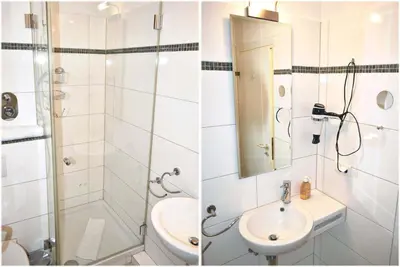 Ein Badezimmer in der Unterkunft Strandhotel Appartement Nr 14 Meerblick