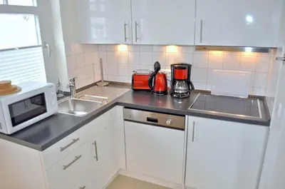 Küche/Küchenzeile in der Unterkunft Strandhotel Ferienwohnung Nr 10