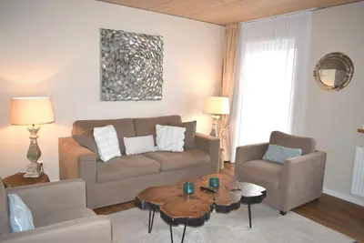 Ein Sitzbereich in der Unterkunft Villa Somersby Ferienwohnung Nr 01