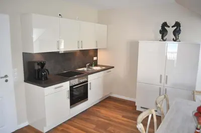 Küche/Küchenzeile in der Unterkunft Villa Somersby Ferienwohnung Nr 06
