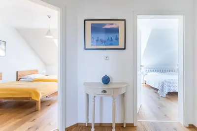 Ein Bett oder Betten in einem Zimmer der Unterkunft Ferienhaus Am Felde