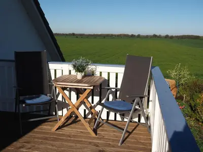 Ein Balkon oder eine Terrasse in der Unterkunft Ferienhaus Am Felde