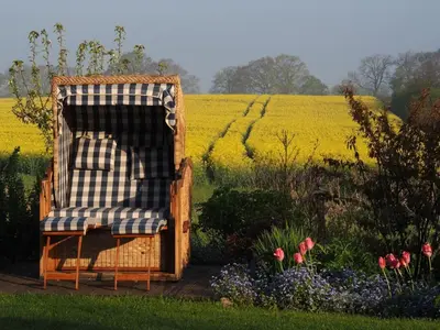 Ein Garten an der Unterkunft Ferienhaus Am Felde