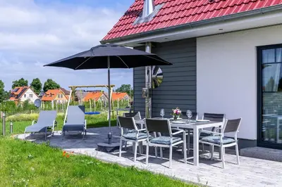 Ein Garten an der Unterkunft Ferienhaus Fine