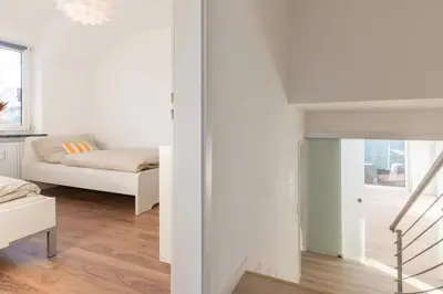 Ein Bett oder Betten in einem Zimmer der Unterkunft Ostseeparadies mit Garten, 3 Zimmer, strandnah