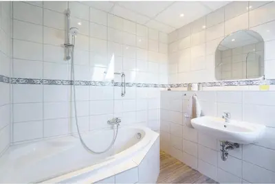 Ein Badezimmer in der Unterkunft SummerBreak 1 Scharbeutz
