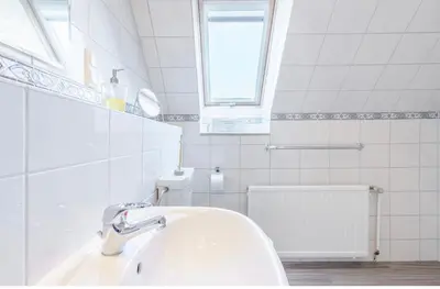 Ein Badezimmer in der Unterkunft SummerBreak 1 Scharbeutz