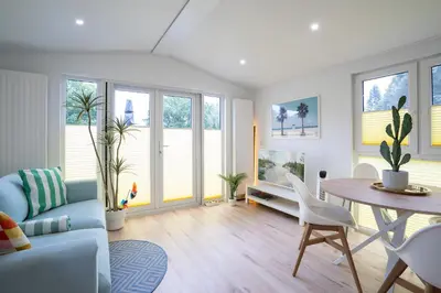 Ein Sitzbereich in der Unterkunft Ostseecamp Ferienhaus 