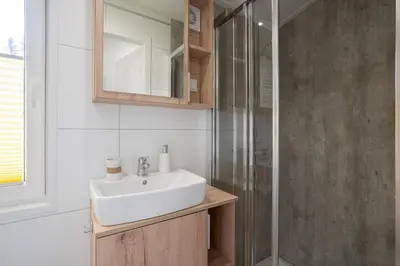Ein Badezimmer in der Unterkunft Ostseecamp Ferienhaus 