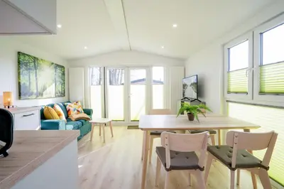 Ein Sitzbereich in der Unterkunft Ostseecamp Ferienhaus 