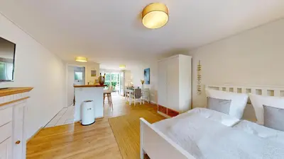 Ein Bett oder Betten in einem Zimmer der Unterkunft Amselweg - Sandkorn