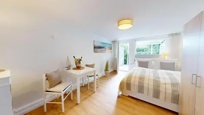 Ein Bett oder Betten in einem Zimmer der Unterkunft Amselweg - Seepferdchen