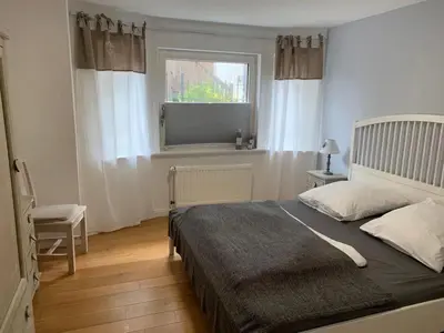 Ein Bett oder Betten in einem Zimmer der Unterkunft Strandallee95