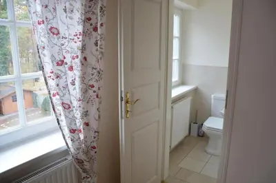 Ein Badezimmer in der Unterkunft Strandallee95