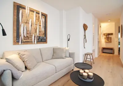 Ein Sitzbereich in der Unterkunft Sunshine Suite - mit Meerblick