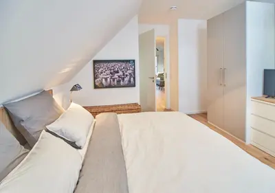 Ein Bett oder Betten in einem Zimmer der Unterkunft Sunshine Suite - mit Meerblick