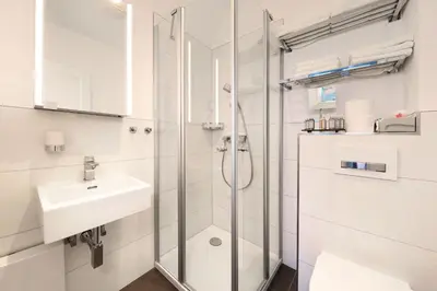 Ein Badezimmer in der Unterkunft Apartment Traveblick