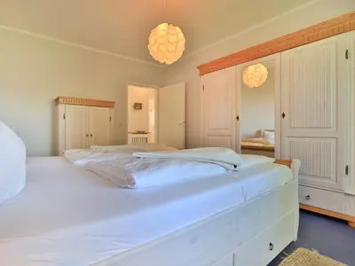 Ein Bett oder Betten in einem Zimmer der Unterkunft Altes Zollhaus, Fewo- Nr 1