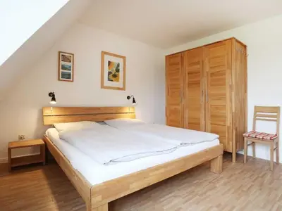 Ein Bett oder Betten in einem Zimmer der Unterkunft Altes Zollhaus, Fewo- Nr 5