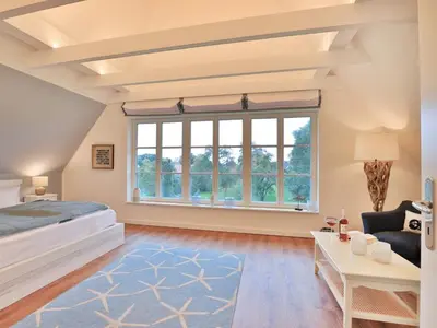 Ein Bett oder Betten in einem Zimmer der Unterkunft Barkley Reethaus