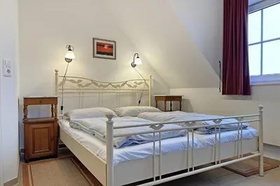 Ein Bett oder Betten in einem Zimmer der Unterkunft Bellevue Ferienwohnung
