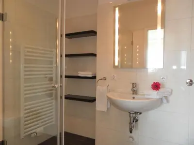Ein Badezimmer in der Unterkunft Fährenkieker