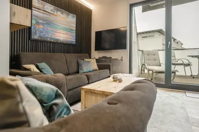 Ein Sitzbereich in der Unterkunft Beach House Penthousewohnung Leuchtturm