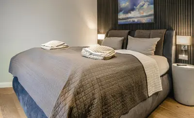 Ein Bett oder Betten in einem Zimmer der Unterkunft Beach House Strandkorb
