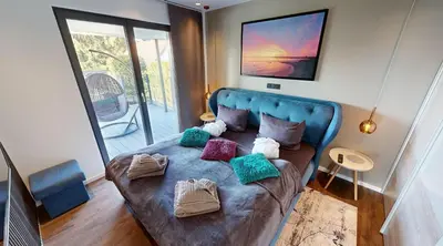 Ein Bett oder Betten in einem Zimmer der Unterkunft Ocean House Freiheit