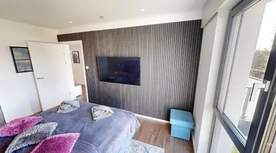 Ein Bett oder Betten in einem Zimmer der Unterkunft Ocean House Herz