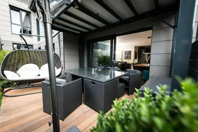 Ein Sitzbereich in der Unterkunft Heaven House Meeresbrise mit Whirlpool