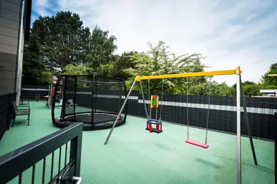 Ein Kinderspielbereich in der Unterkunft Heaven House Regenbogen