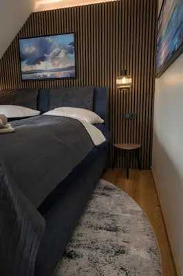 Ein Bett oder Betten in einem Zimmer der Unterkunft Wellness House Relax mit Whirlpool
