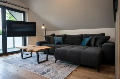 Ein Sitzbereich in der Unterkunft Wellness House Relax mit Whirlpool