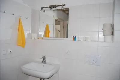 Ein Badezimmer in der Unterkunft Ferienhaus Meerblick