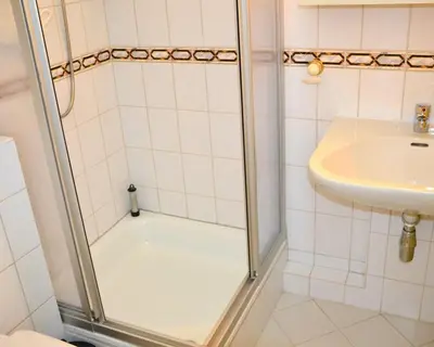 Ein Badezimmer in der Unterkunft Ferienpark am Fahrenkroog Meerbrise Aparmtent 287