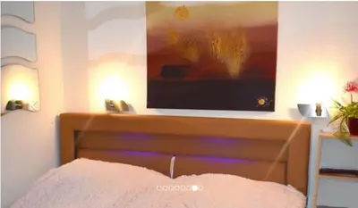Ein Bett oder Betten in einem Zimmer der Unterkunft Ferienpark am Fahrenkroog Meerbrise Aparmtent 287