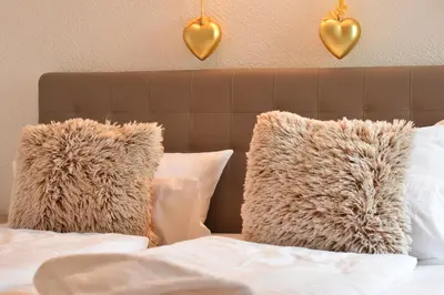 Ein Bett oder Betten in einem Zimmer der Unterkunft Ferienpark am Fahrenkroog Wolke 9 Apartment 352