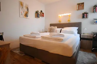Ein Bett oder Betten in einem Zimmer der Unterkunft Ferienpark am Fahrenkroog Wolke 9 Apartment 352