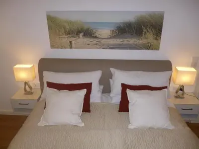 Ein Bett oder Betten in einem Zimmer der Unterkunft Ostsee-Wellnesslandhaus mit Sauna, Jacuzzi, Innenwhirlpool
